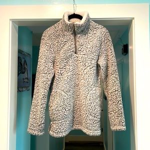 3 1/4 zip collared fleece. Very thick and fluffy. Super comfy and warm!